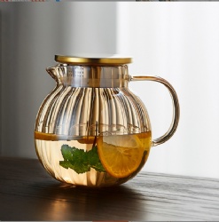 Pumpkin shaped glass teapot